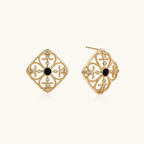 Gold filigree stud earrings with navy lapis lazuli center stone and mother-of-pearl accents in ornate quatrefoil design