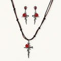 Gothic jewelry set with dark metal thorny cross pendants featuring red enamel roses and matching red crystal earrings
