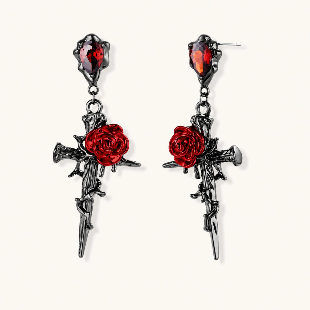 Gothic jewelry set with dark metal thorny cross pendants featuring red enamel roses and matching red crystal earrings