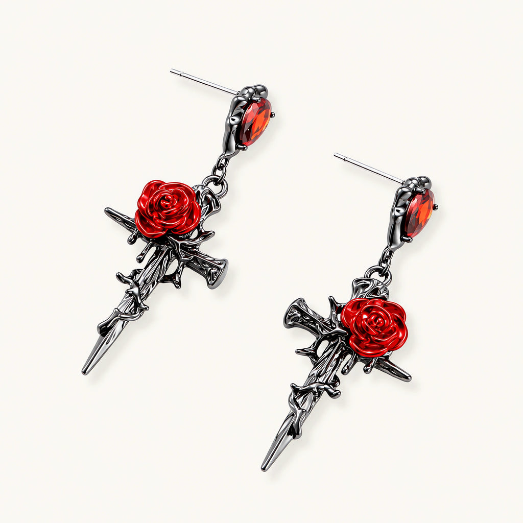 Gothic jewelry set with dark metal thorny cross pendants featuring red enamel roses and matching red crystal earrings